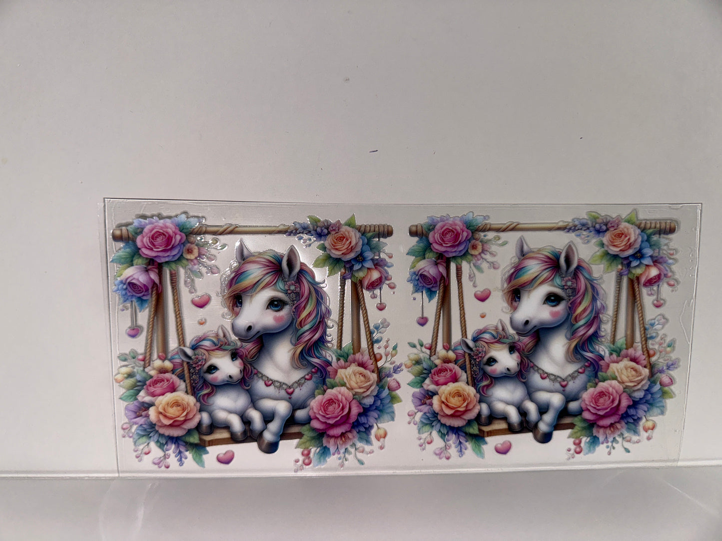 H577 unicorn on swing