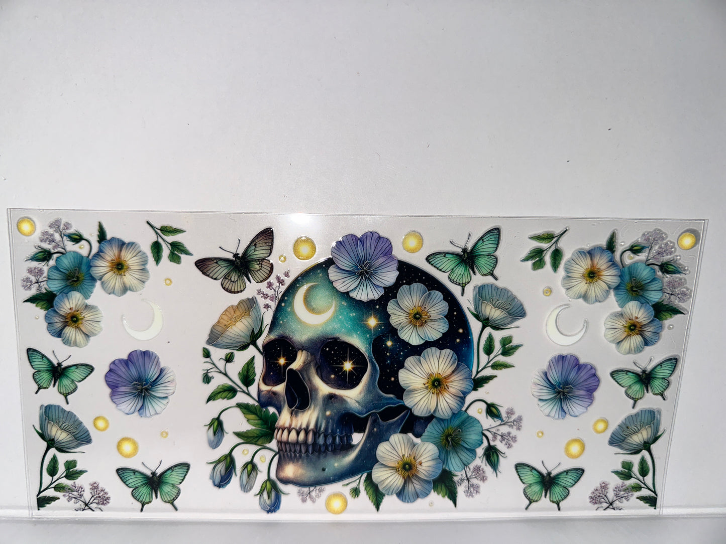 G1262 skull with flowers, moons, and butterflies