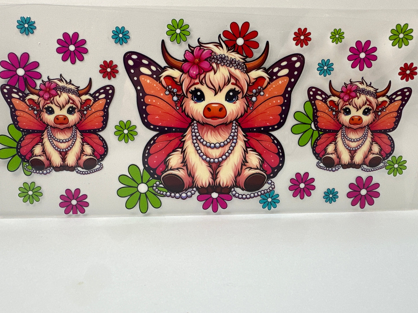 F846 butterfly cow with flowers