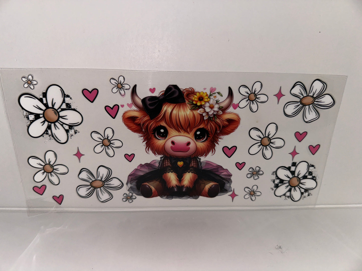 H132 cow with black tutu and flowers