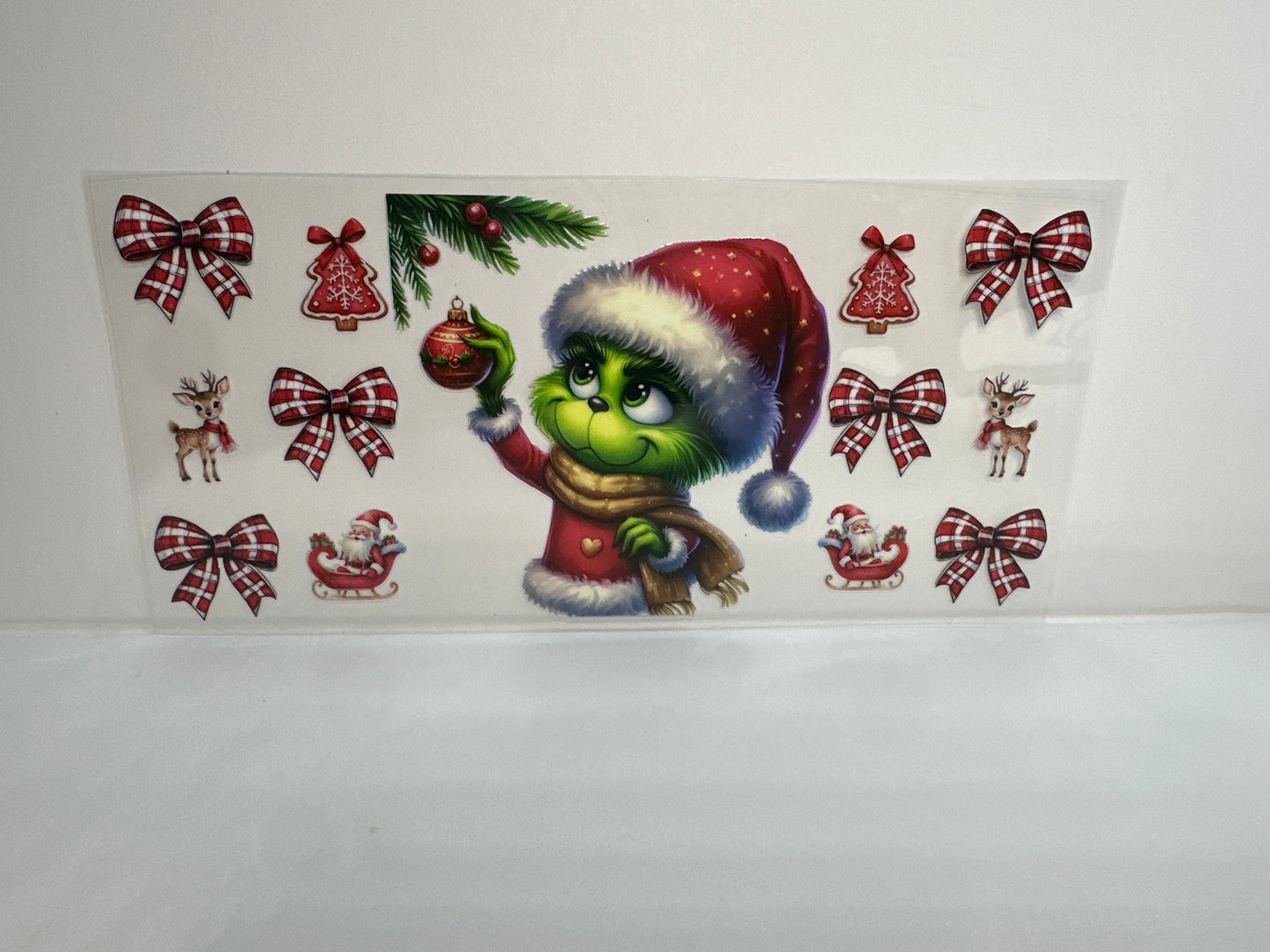 G248 grinch with Christmas ornaments and bows