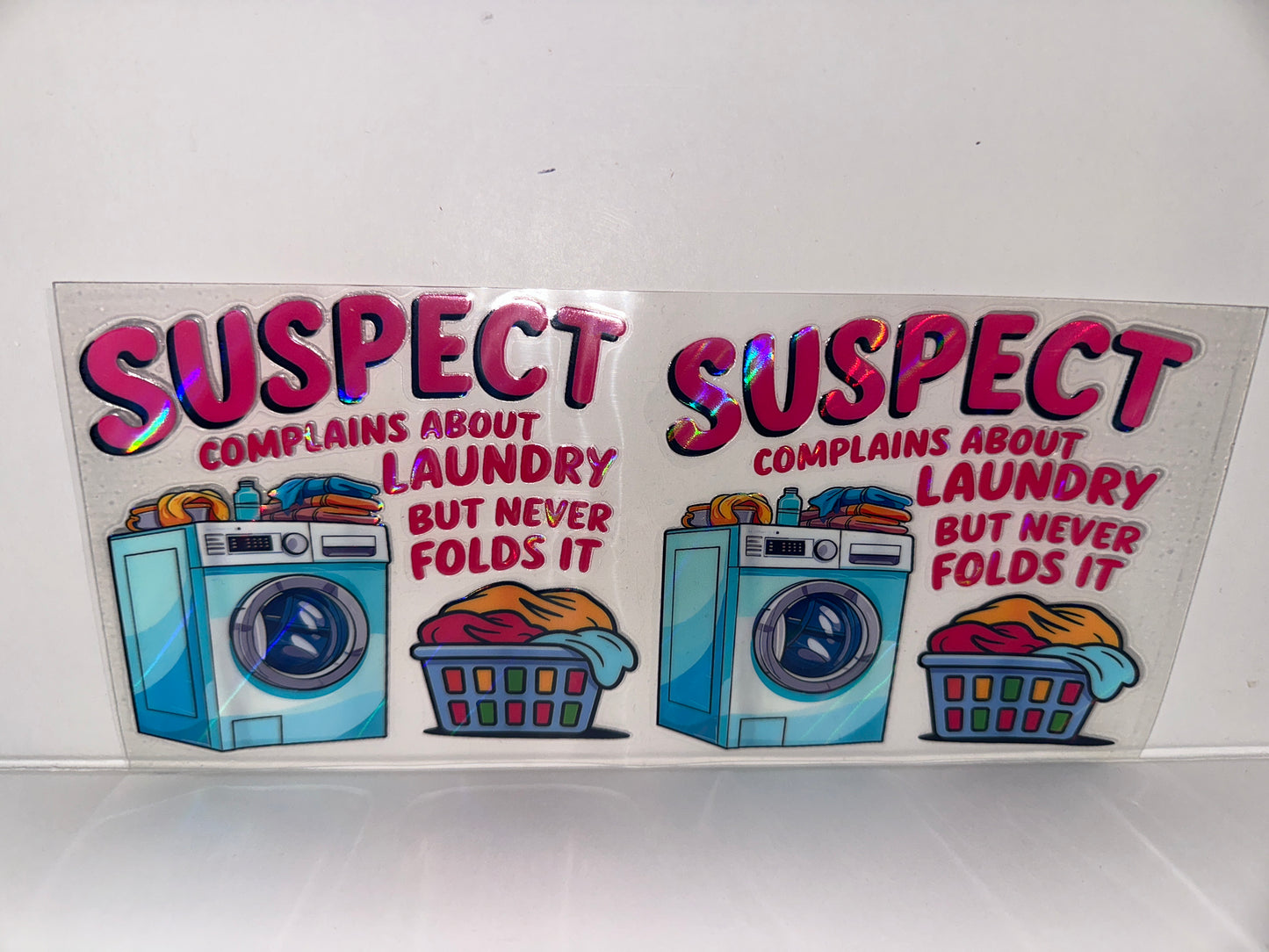 H571 suspect complains about laundry, but never folds it holographic