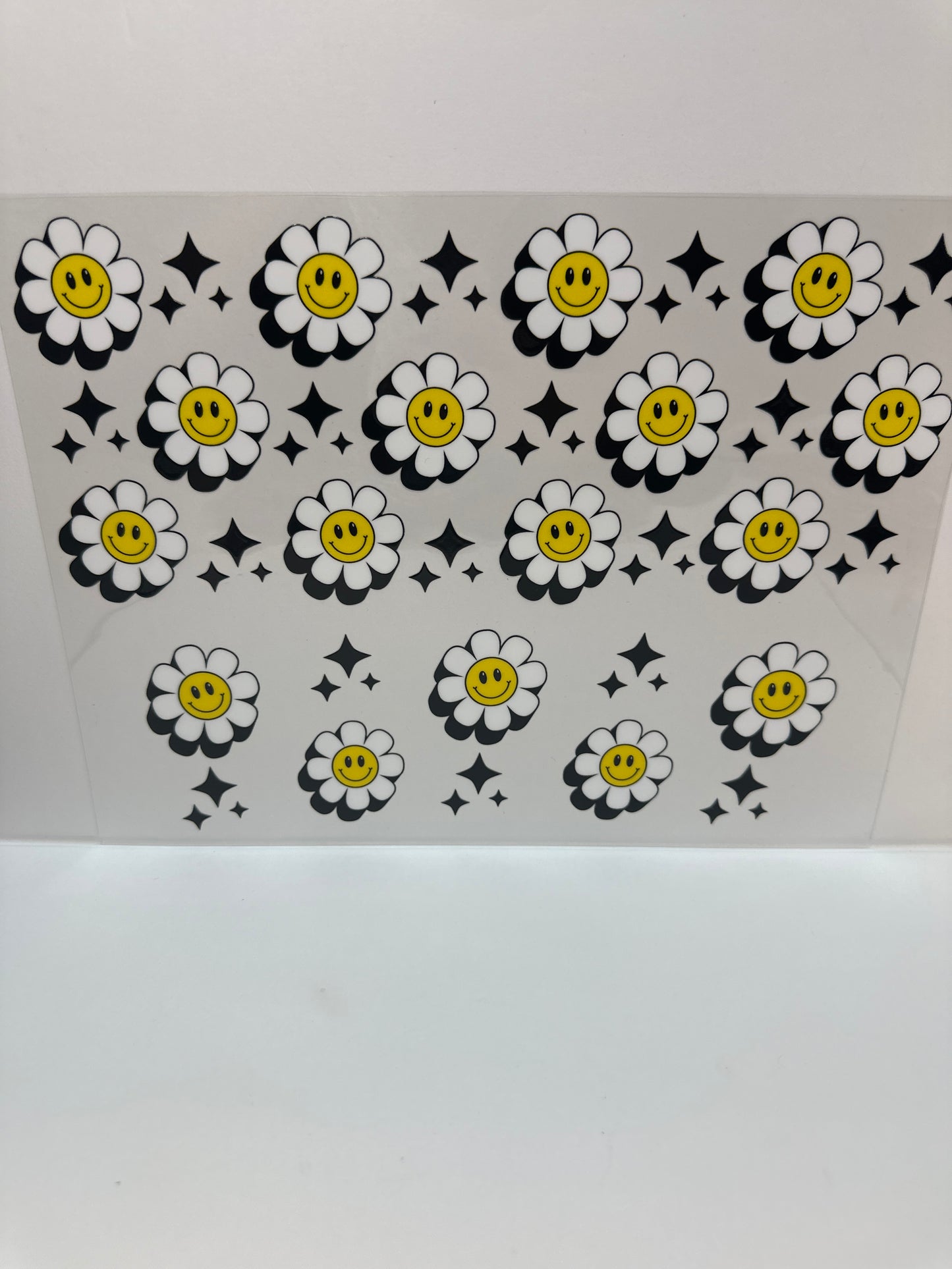 F791 flowers with face and black stars 40 ounce cup wrap