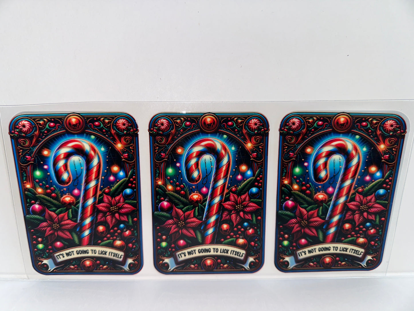 G1095 it’s not going to lick itself candy cane tarot card