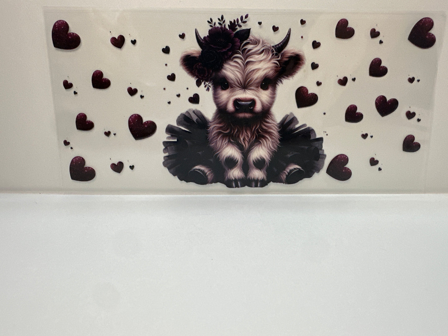 F434 cow with maroon hearts and flowers