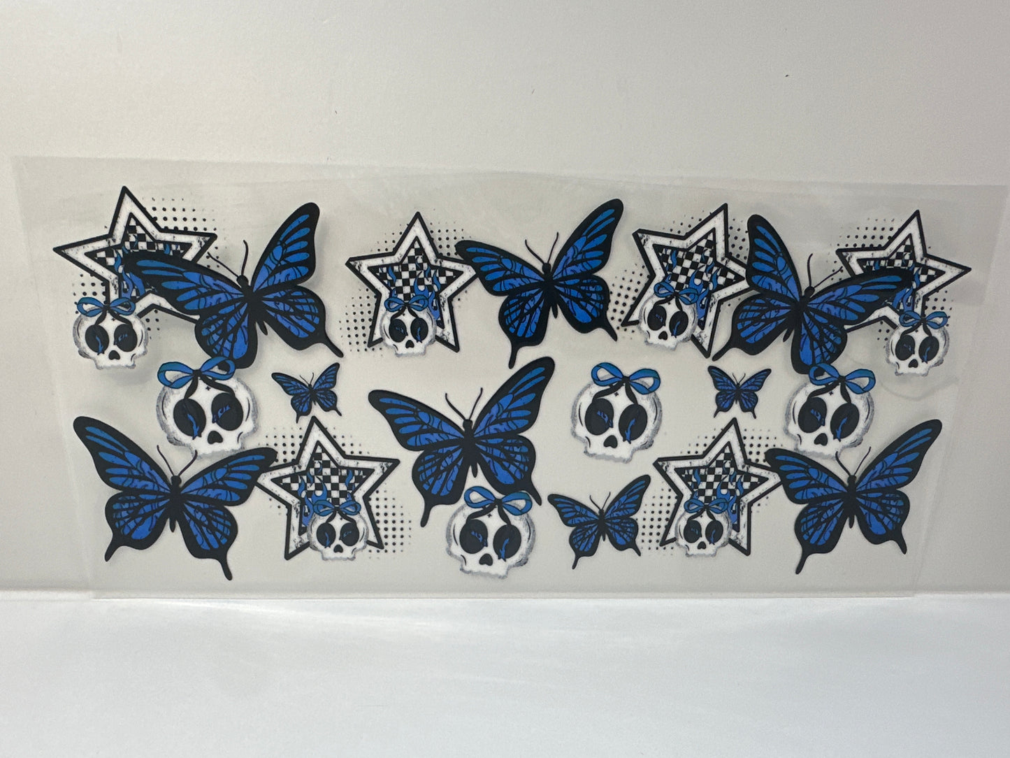 G516 plaid skulls with butterflies blue