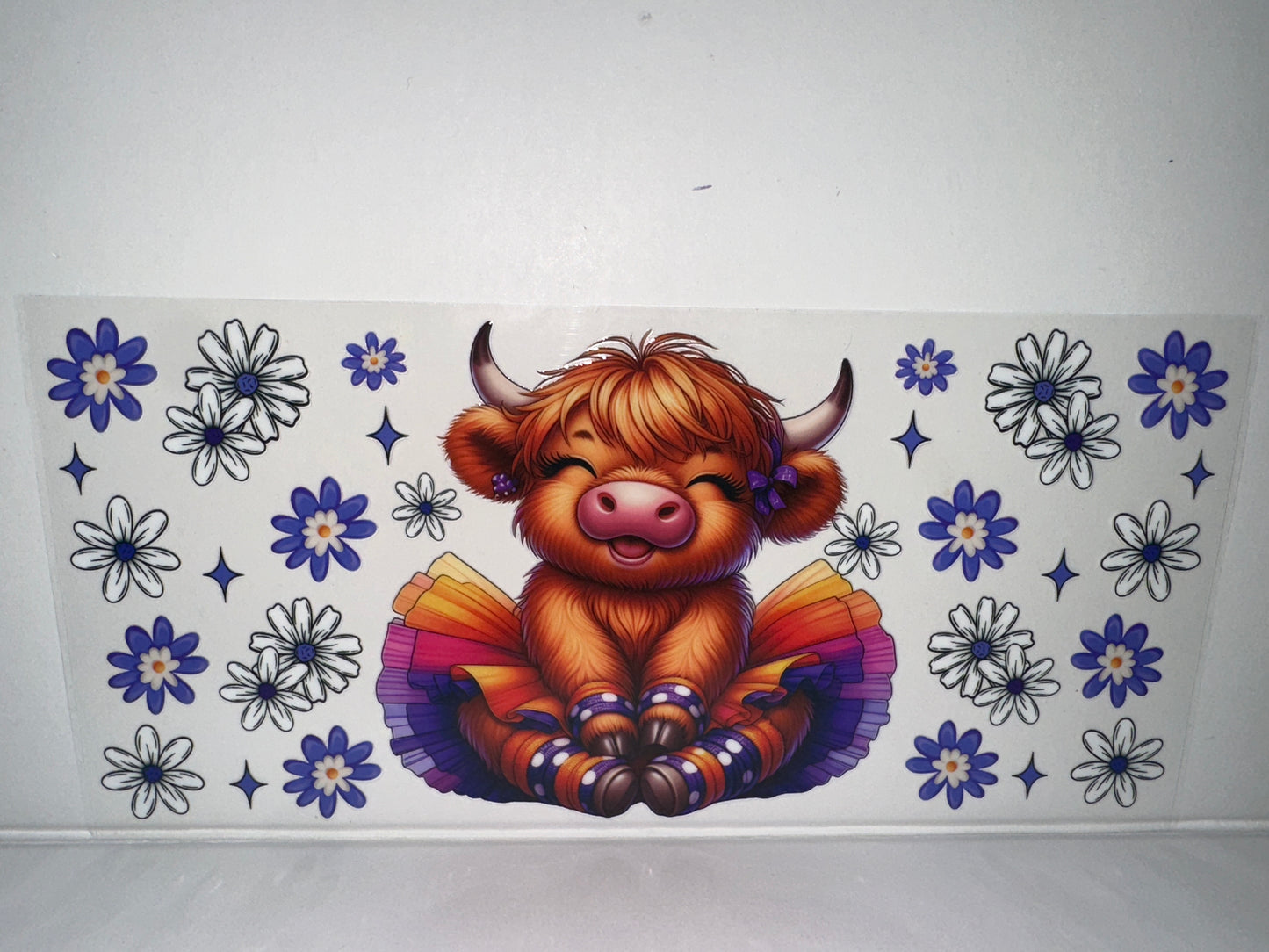 H445 Cow in tutu with flowers