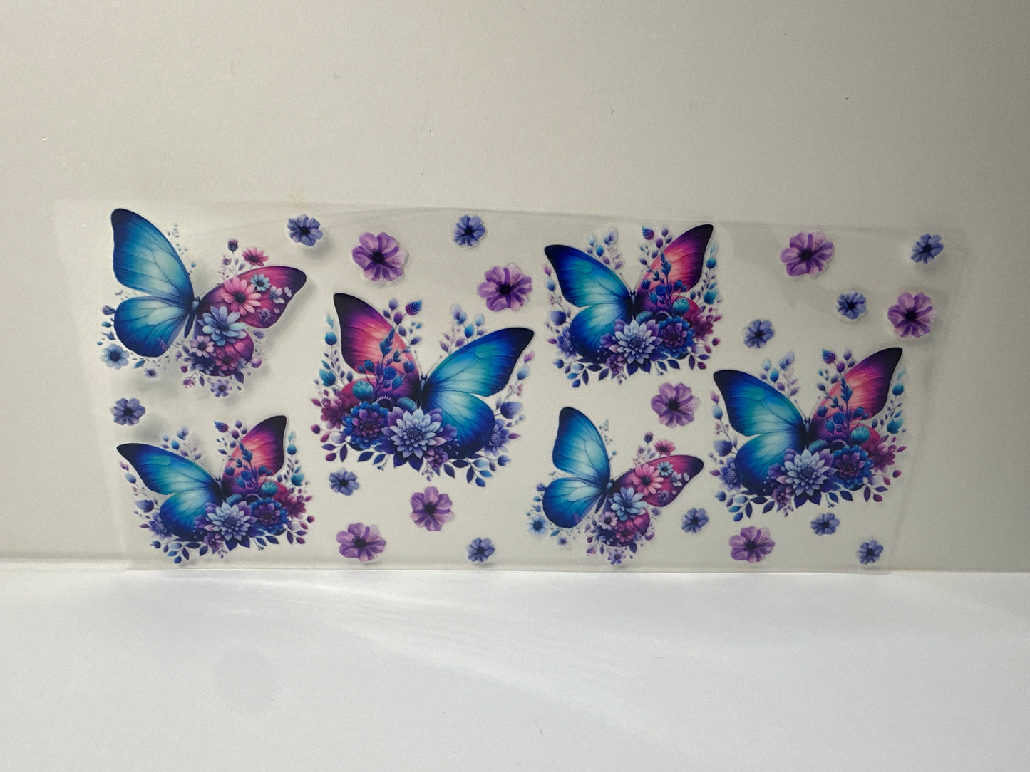 G389 blue and purple butterfly with flowers