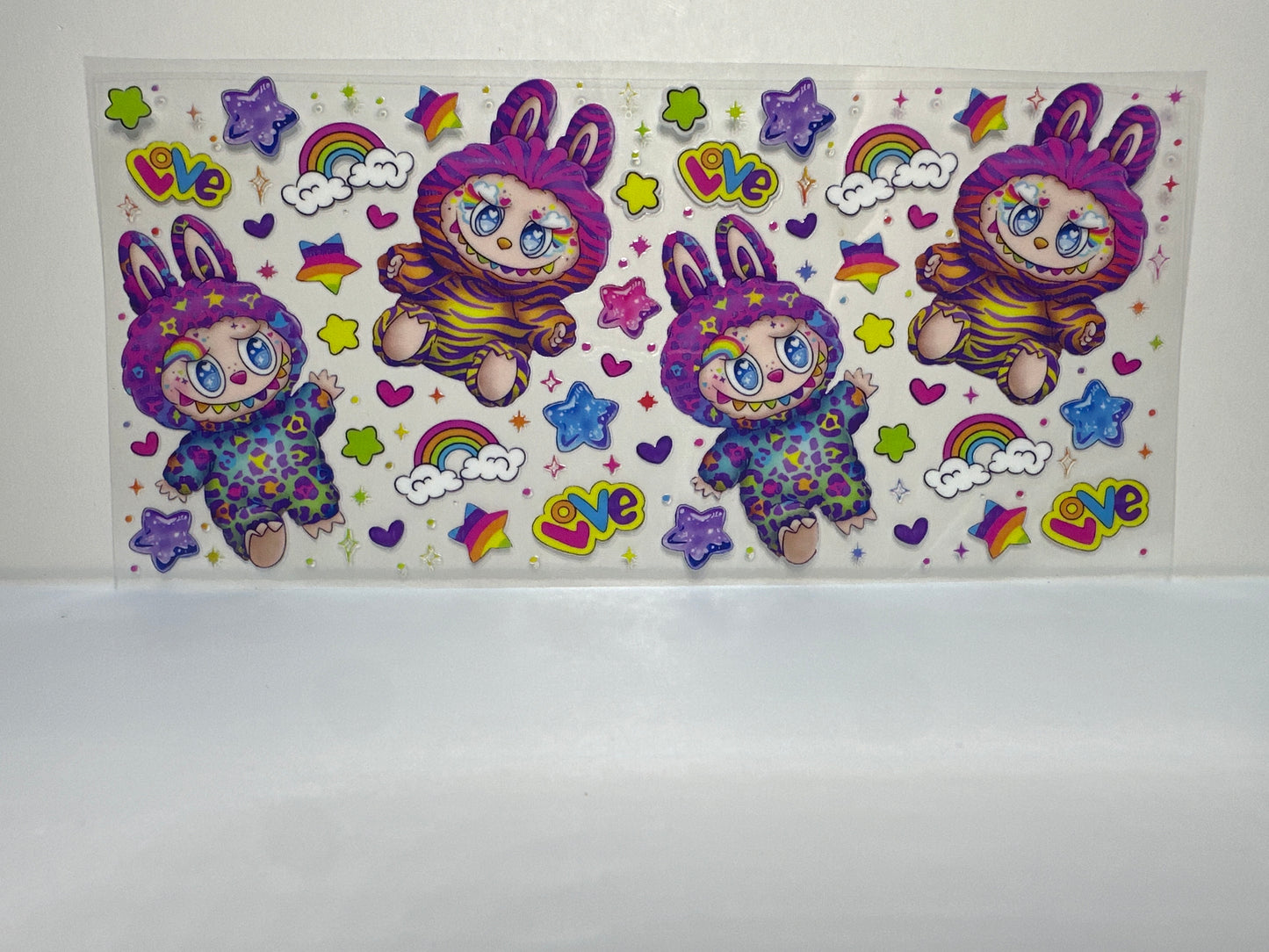 F 79 Labubu with rainbows and stars