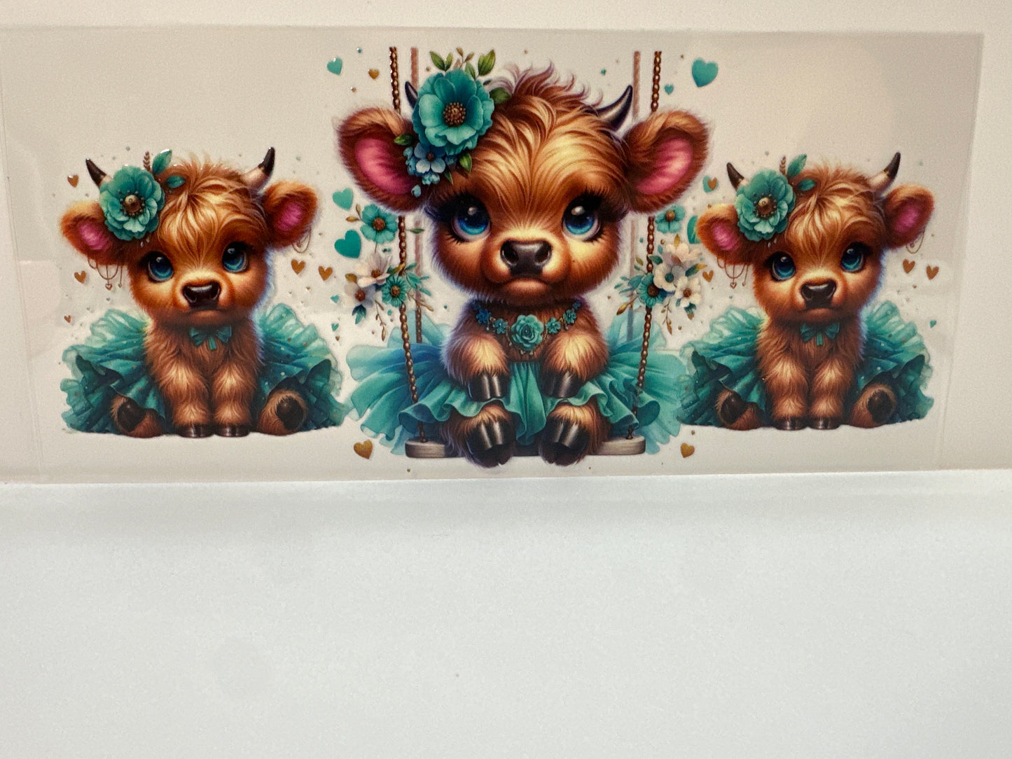 F433 cow and swing teal