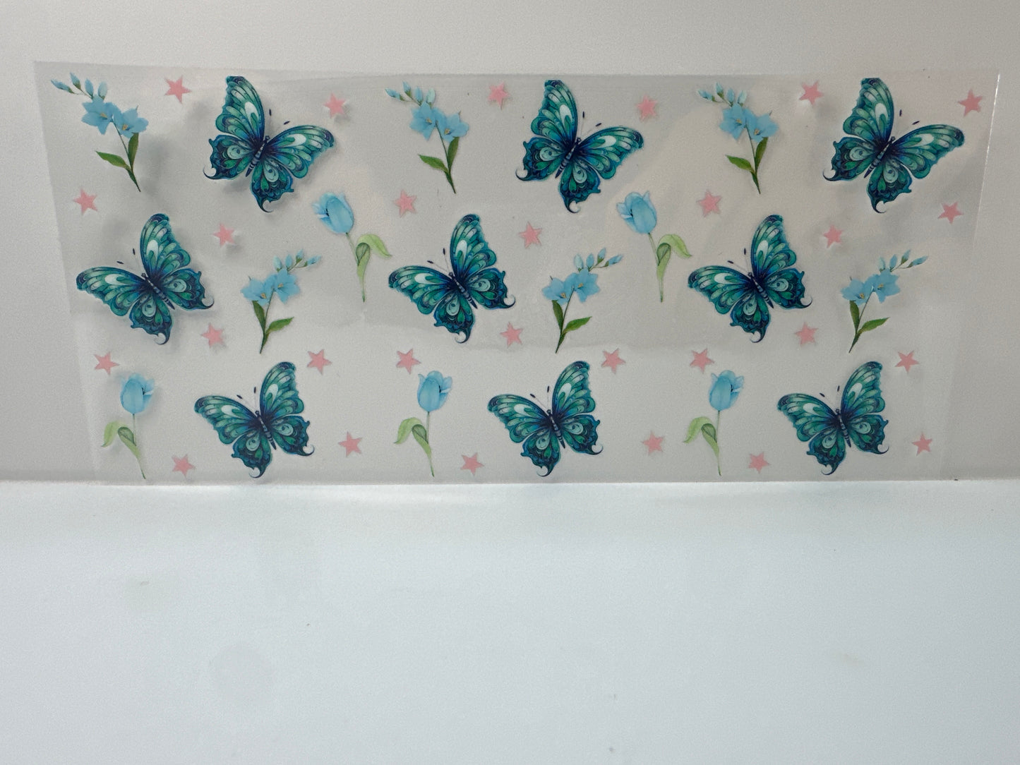 F896 teal butterflies with flowers