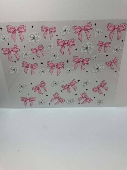 F782 pink bows with white flowers and black stars 40 ounce cup wrap