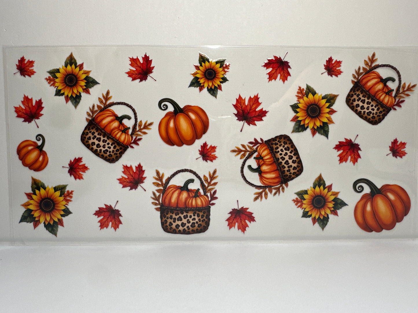 F385 Fall time, pumpkins with sunflowers and leaves