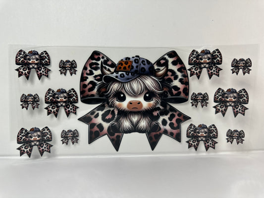 E221 Cow with cheetah bows