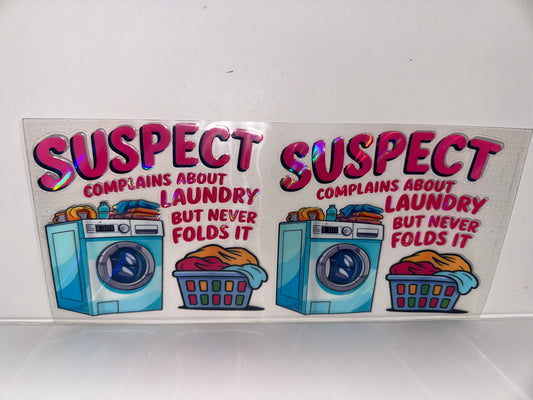 H571 suspect complains about laundry, but never folds it holographic