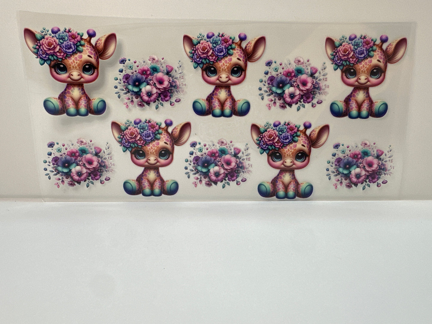 F428 giraffe with flowers