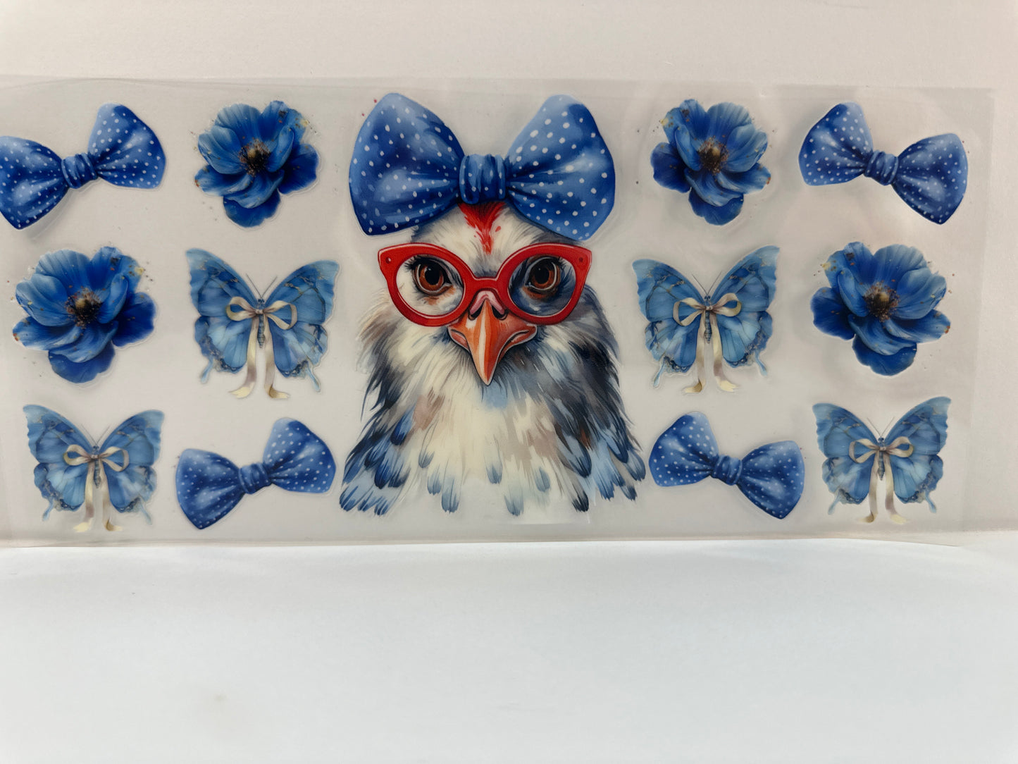 F960 chicken with blue bows and butterflies