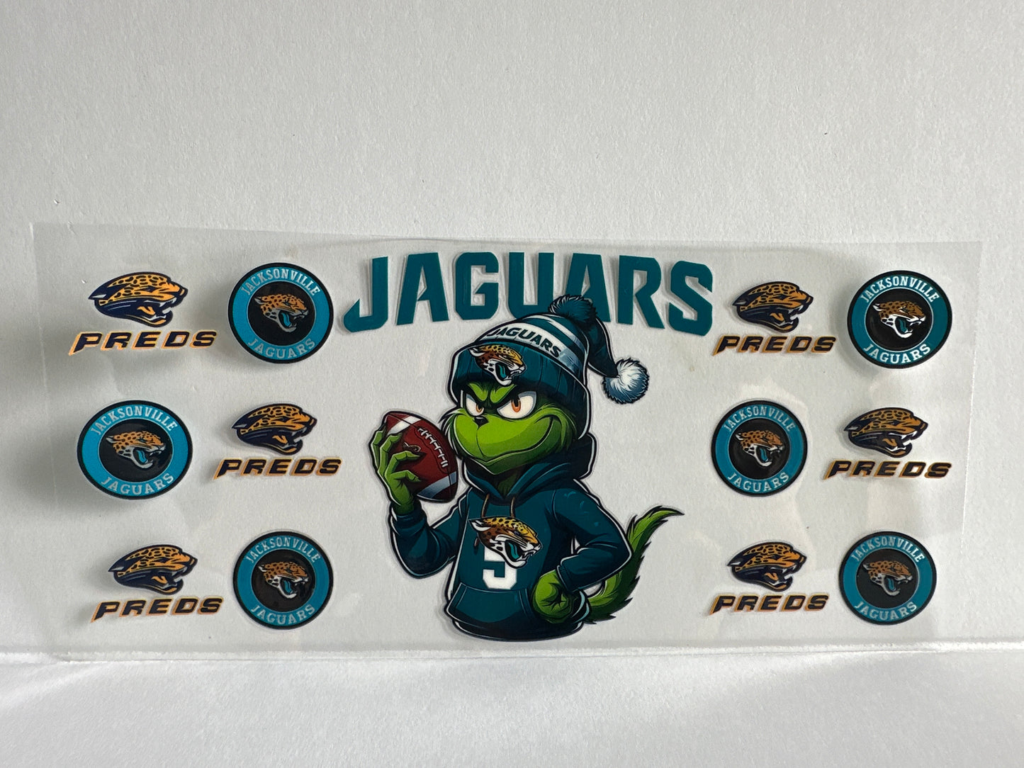 G1300 NFL football jaguars, grinch