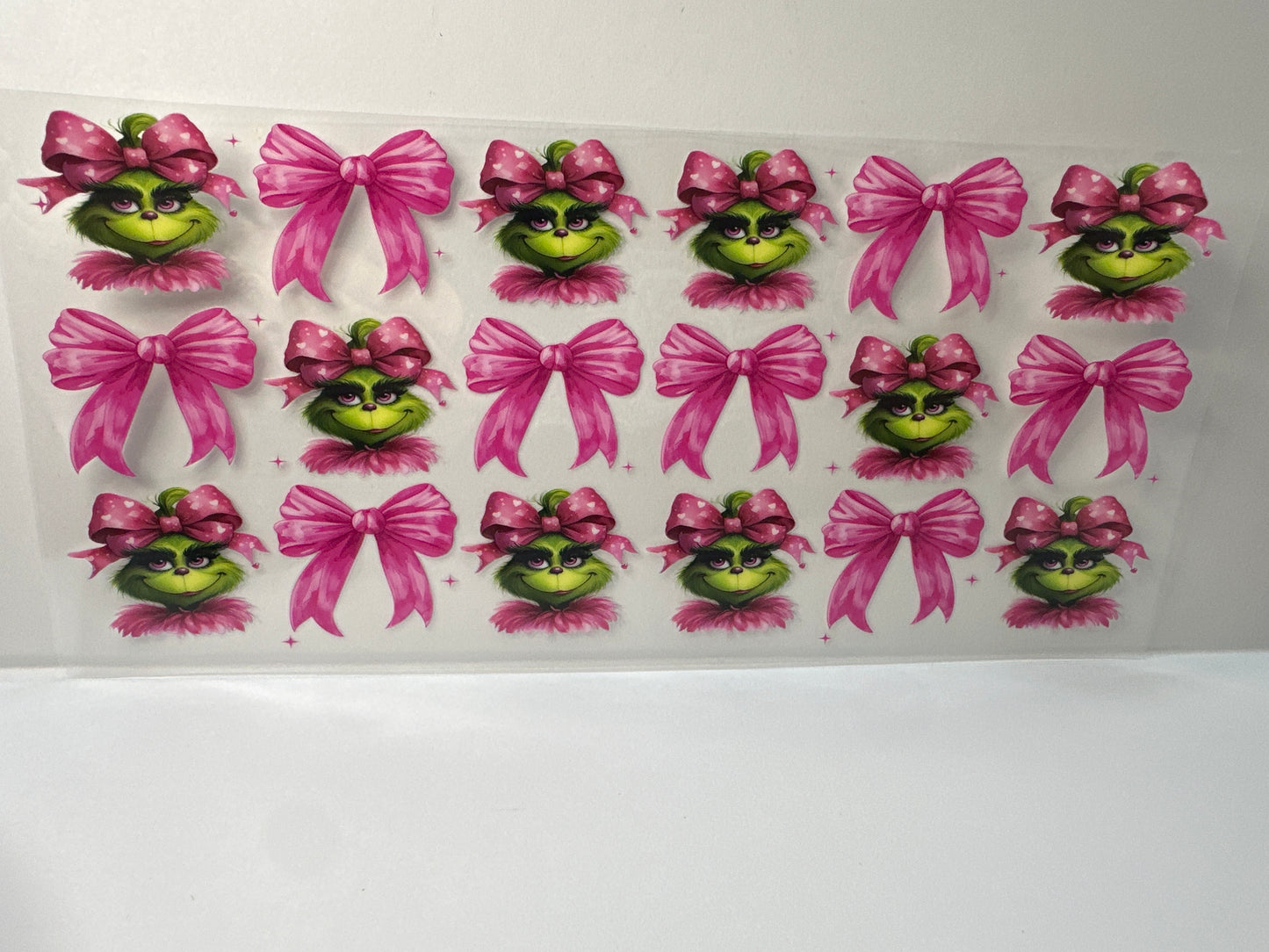 F660 pink Grinch w/bows Christmas