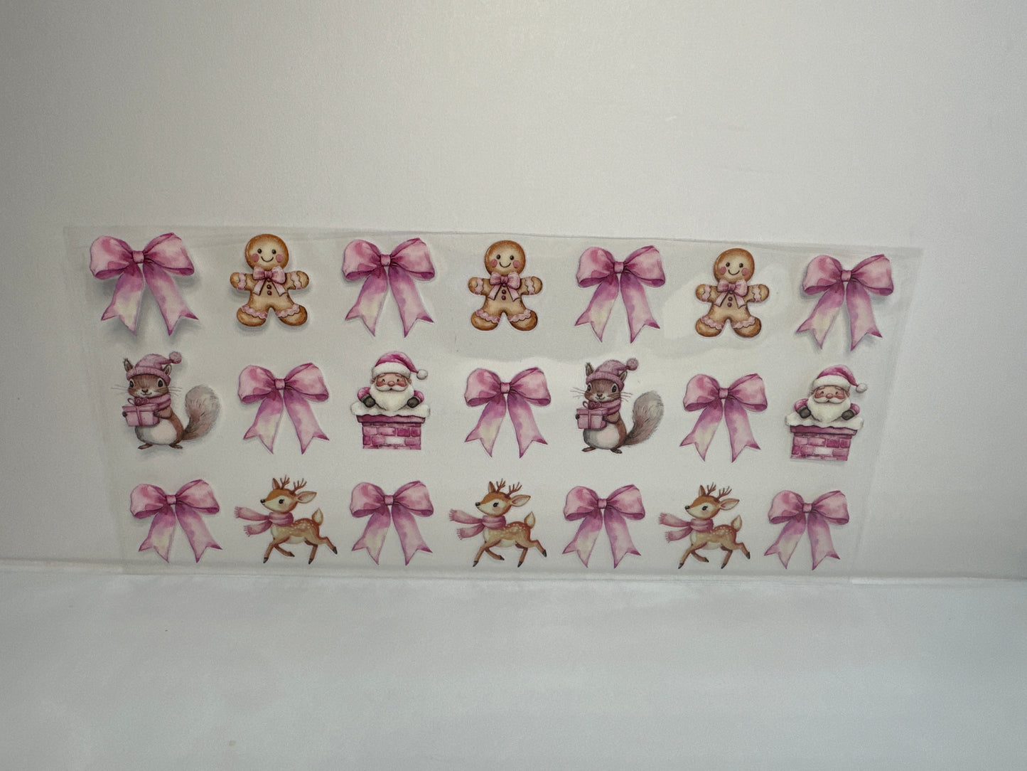 G226 pink Santa with Bose gingerbread man and squirrel and deer