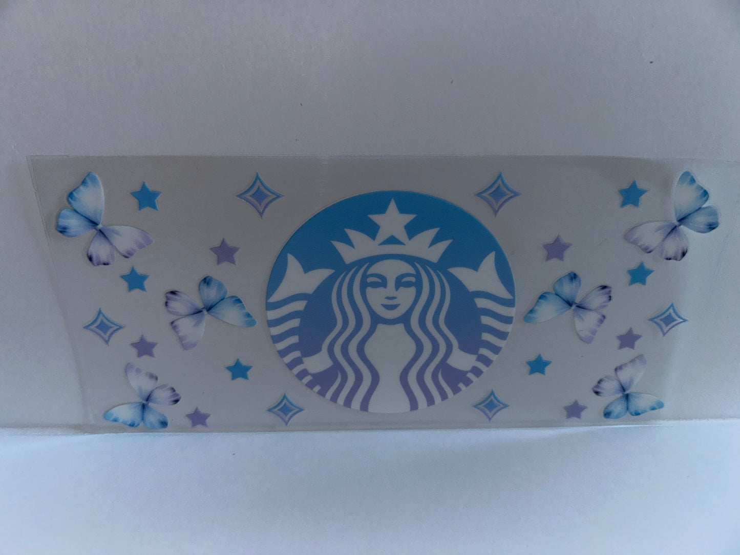 G1060 coffee Starbucks with stars blue purple and butterflies