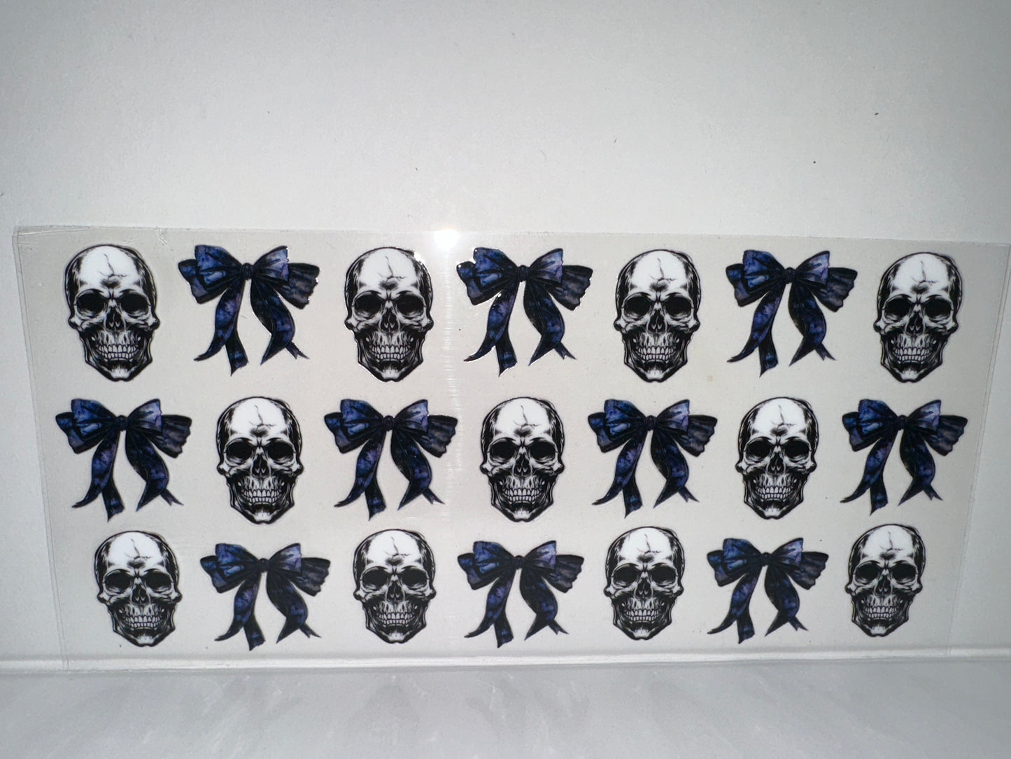 G1261 skulls and blue bows