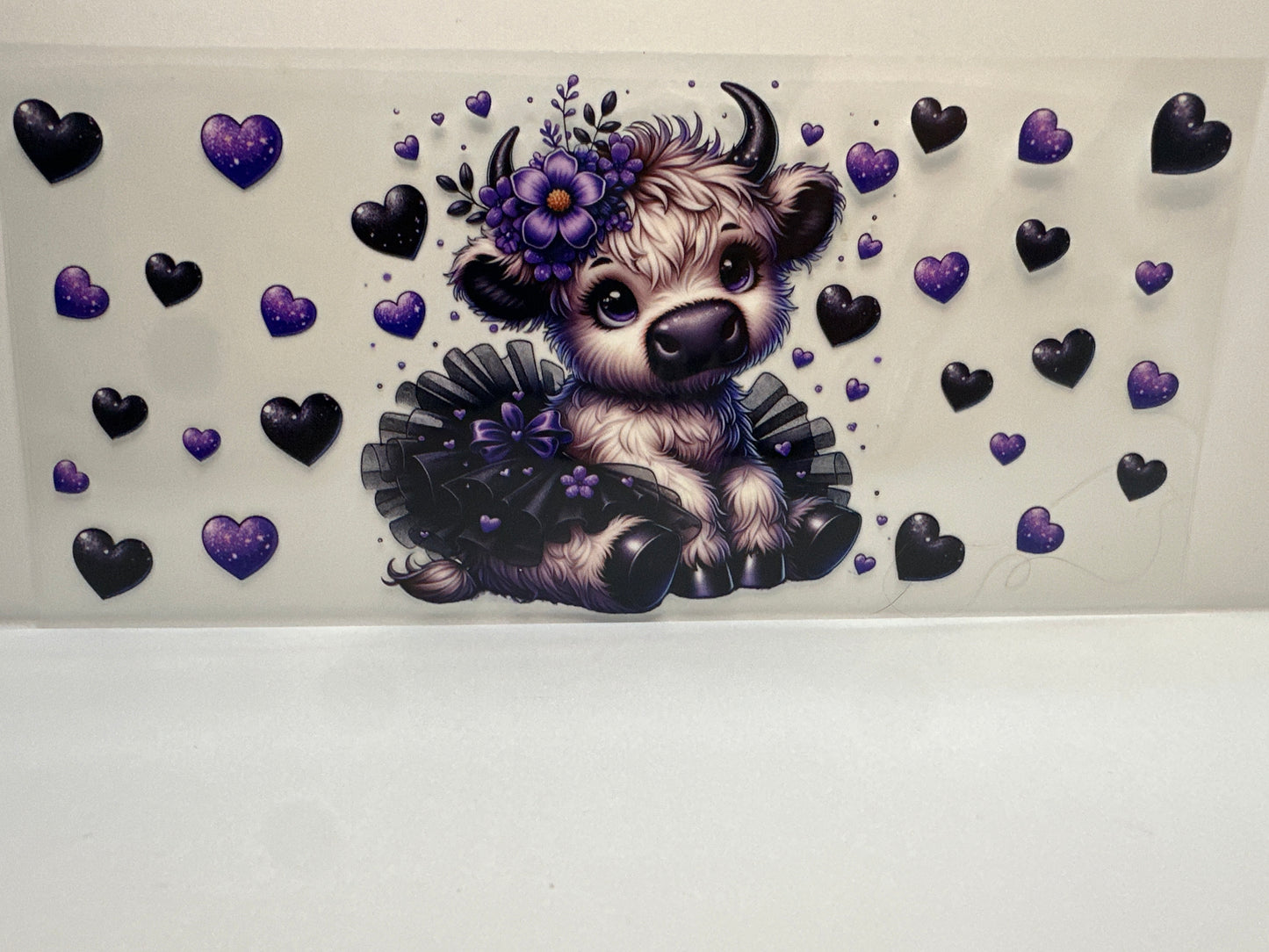 F419 cow with purple and black