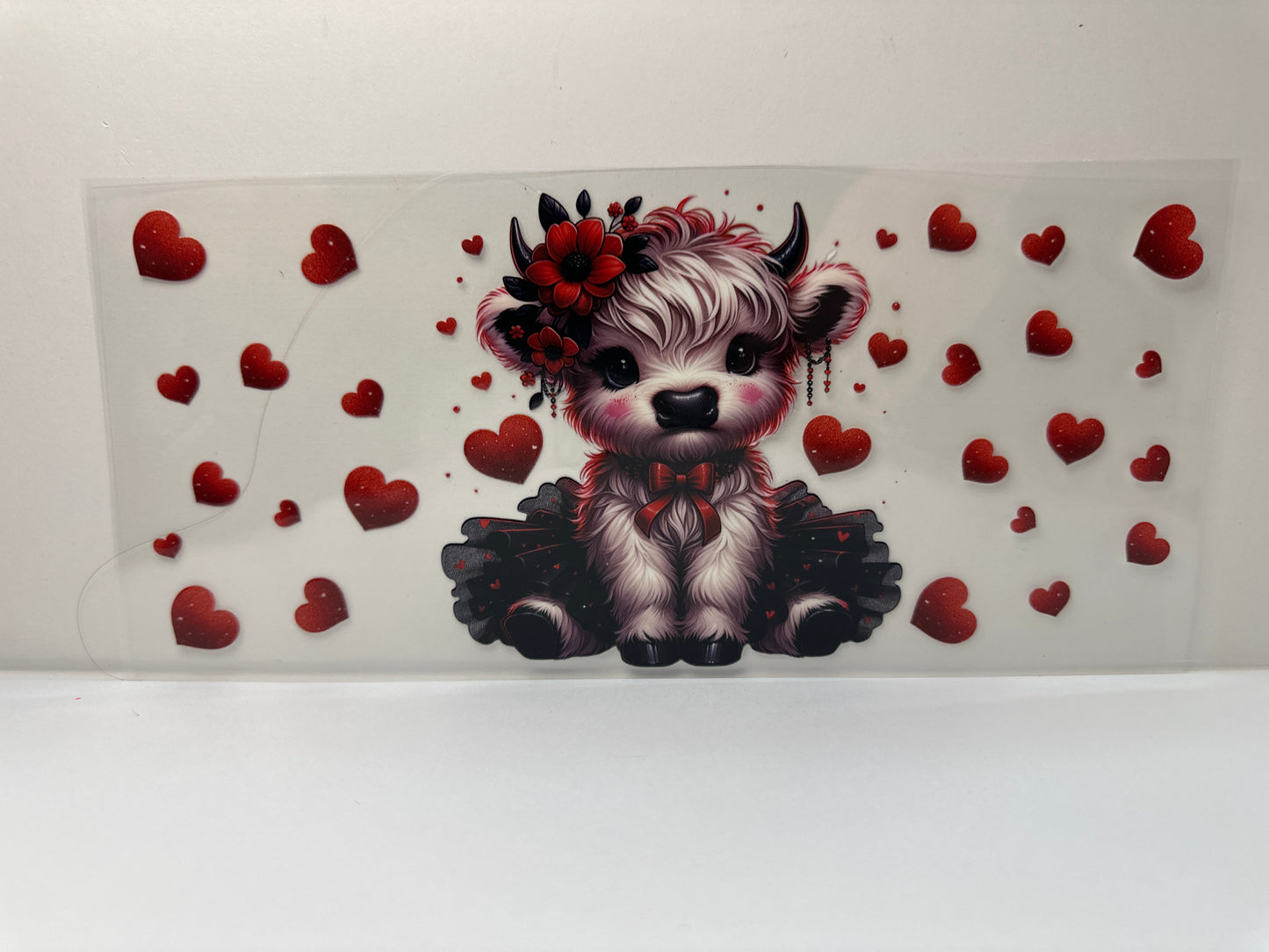 F439 cow with red hearts