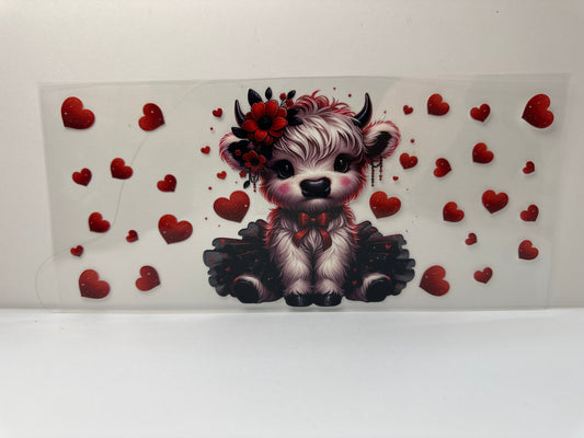 F439 cow with red hearts