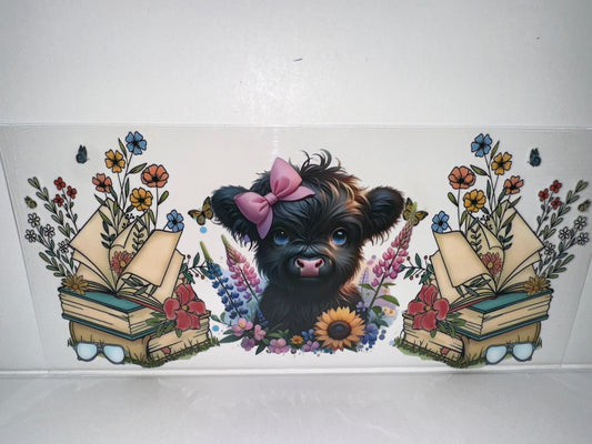 H449 Cow with books and flowers