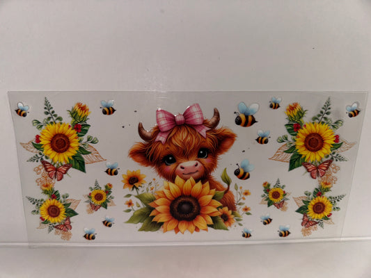 H137 cow with sunflowers and bees