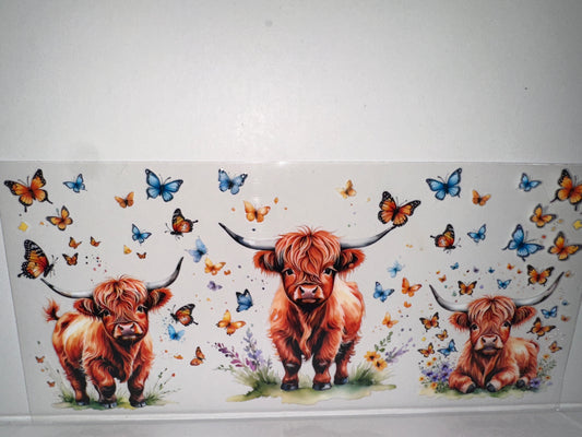 H139  cow with butterflies