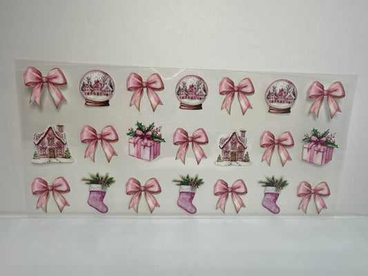 G225 pink Christmas snow globes with bows