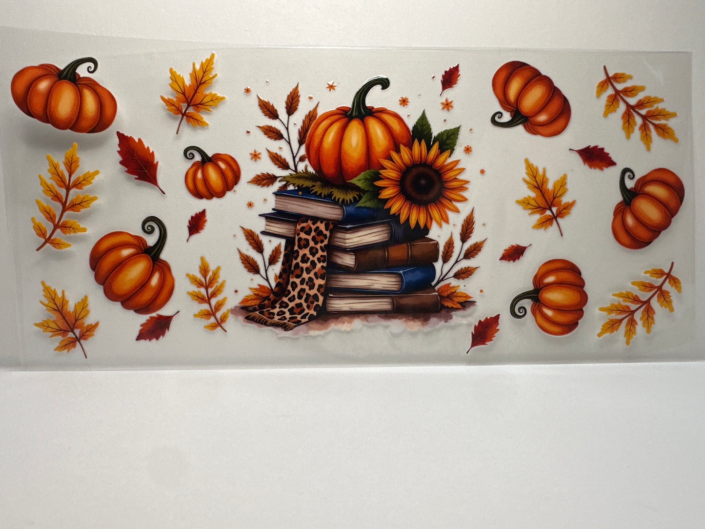 F386 Fall time pumpkins leaves, sunflower with books