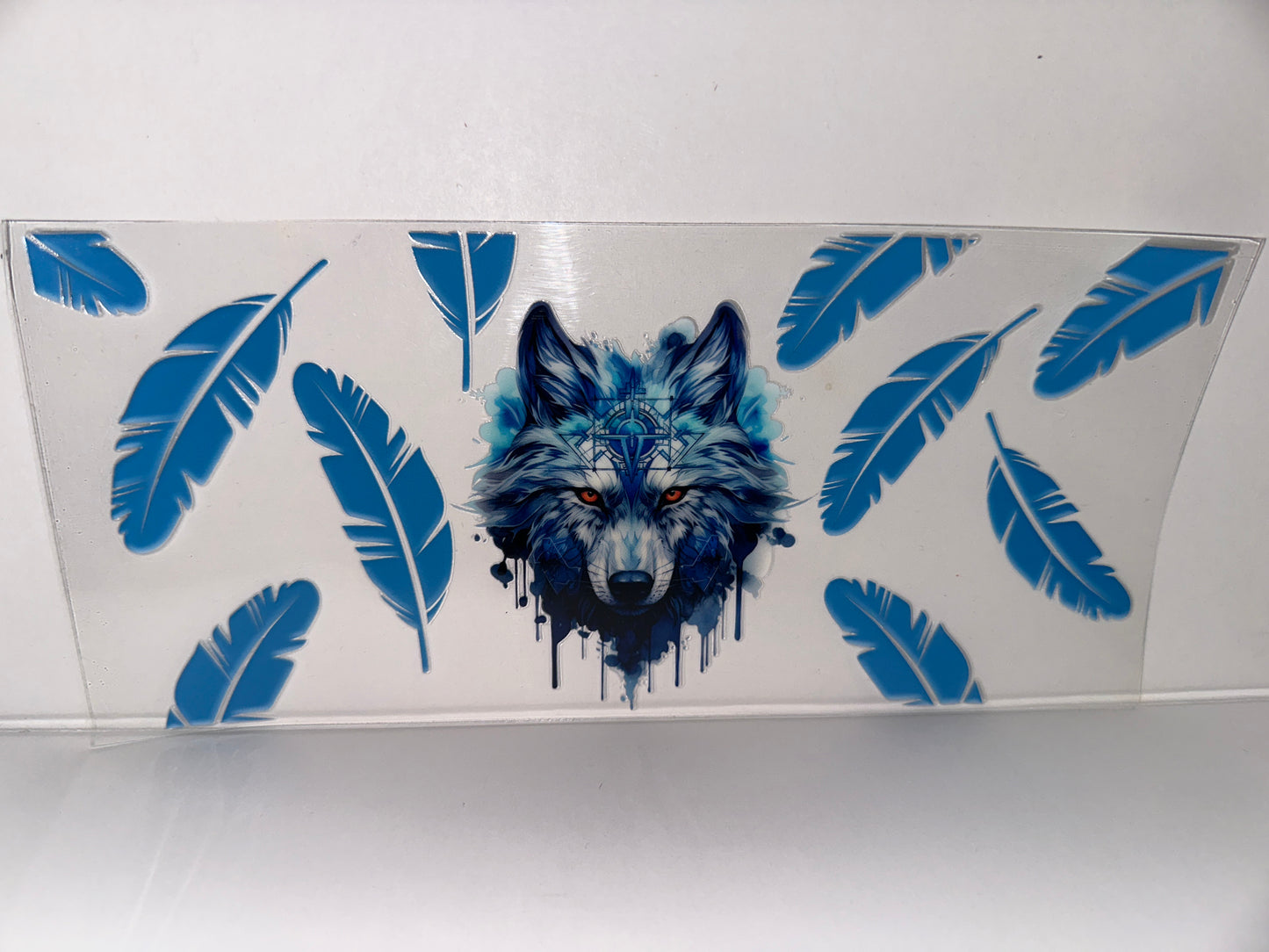 H142 wolf w/ blue feathers