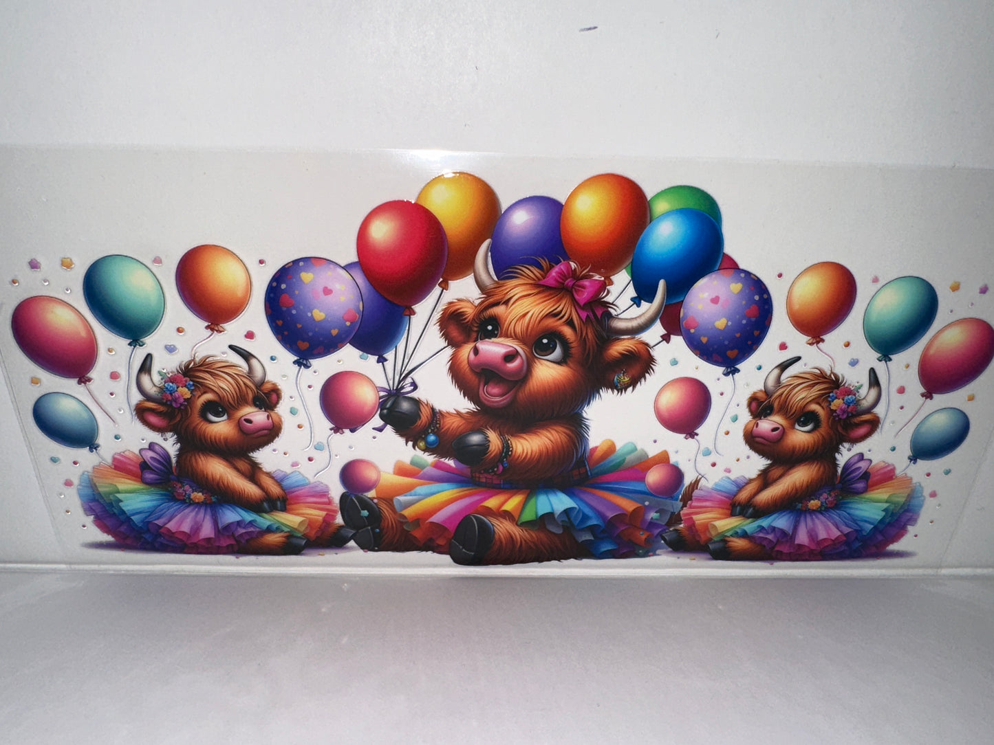 H469 cow with balloons