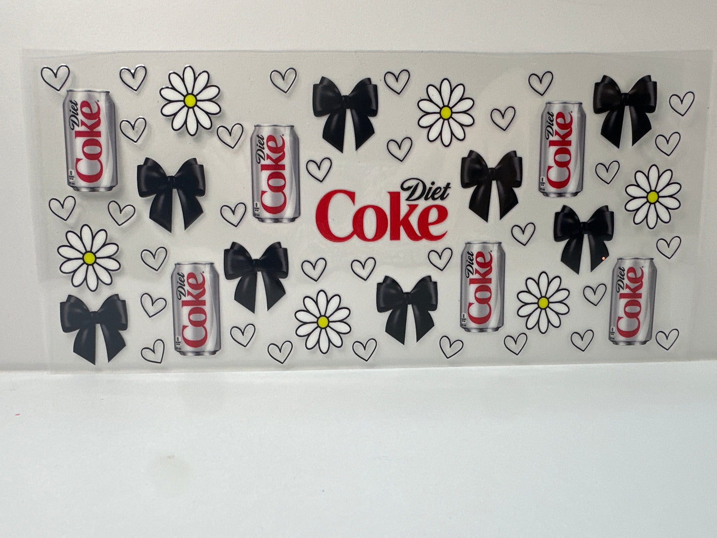 F903 Diet Coke with black heart, bows and daisies