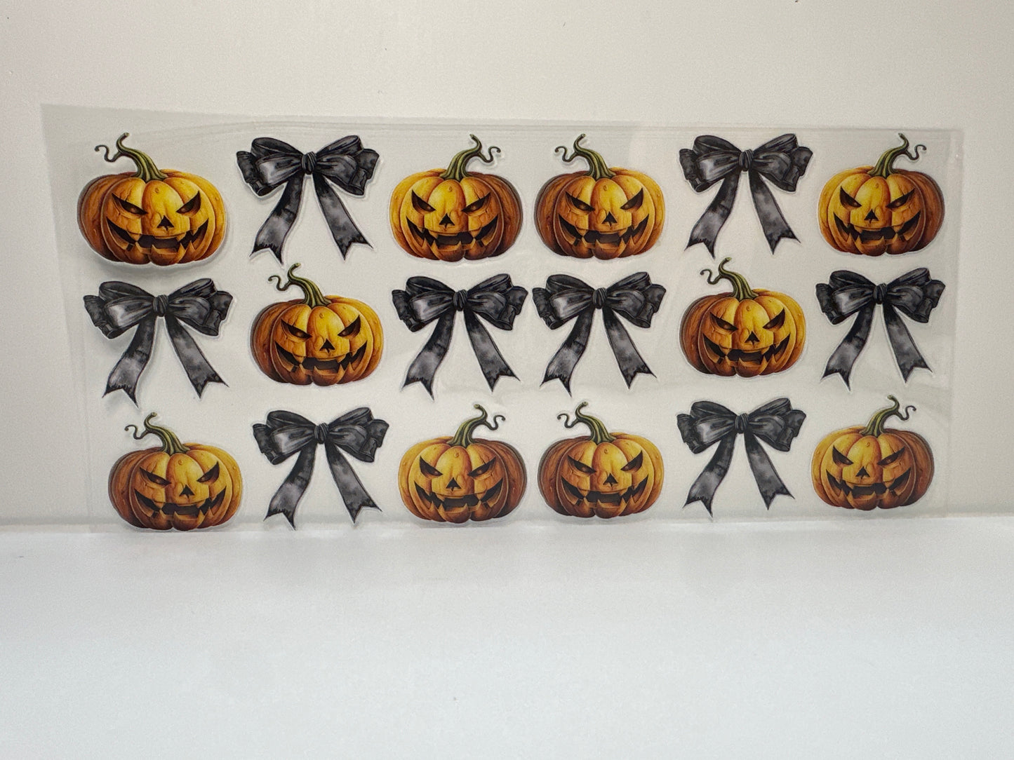F373 Halloween pumpkin with black bows