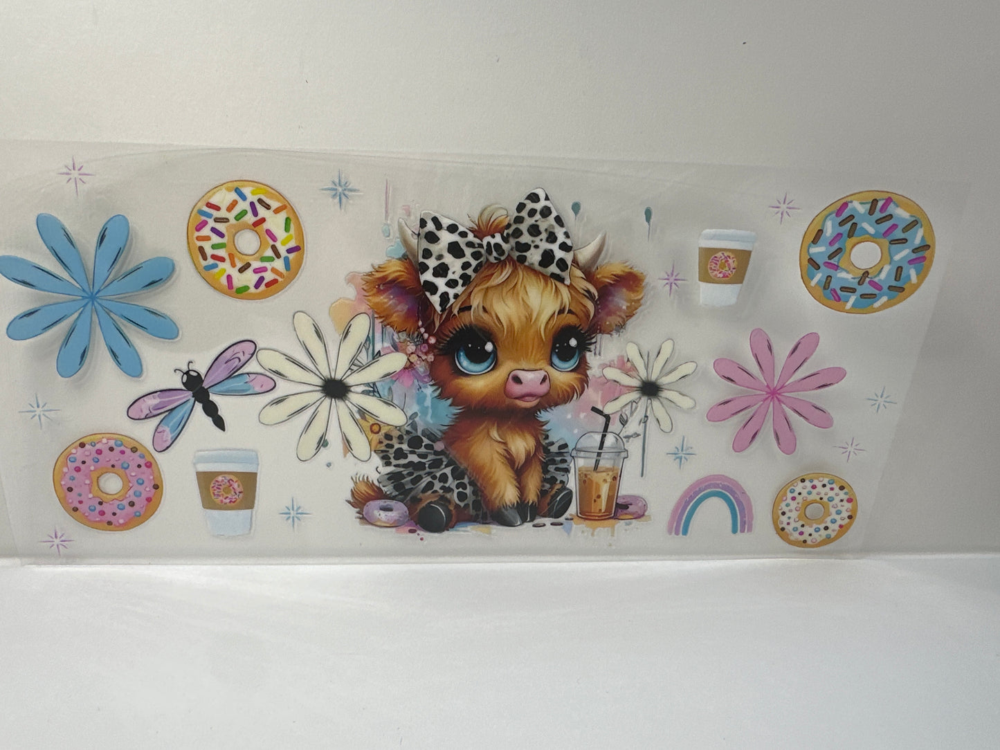 G500 cow with tutu with donuts and coffee